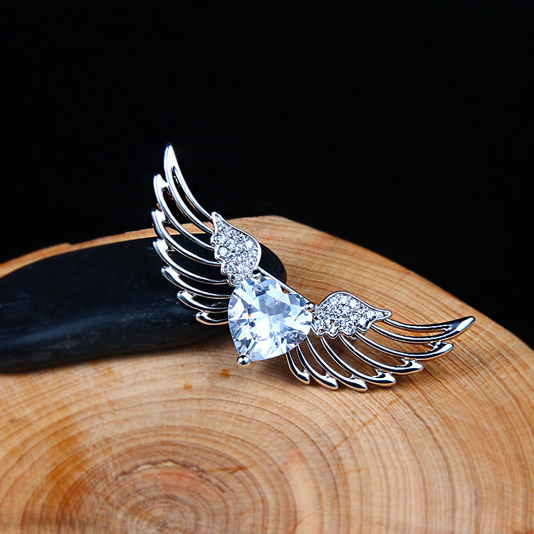 Angel wings brooch