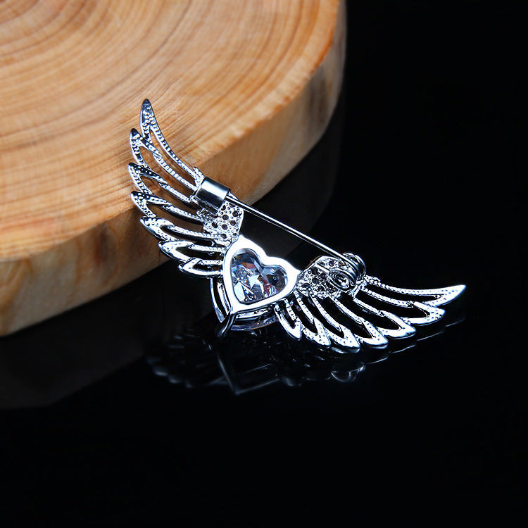 Angel wings brooch